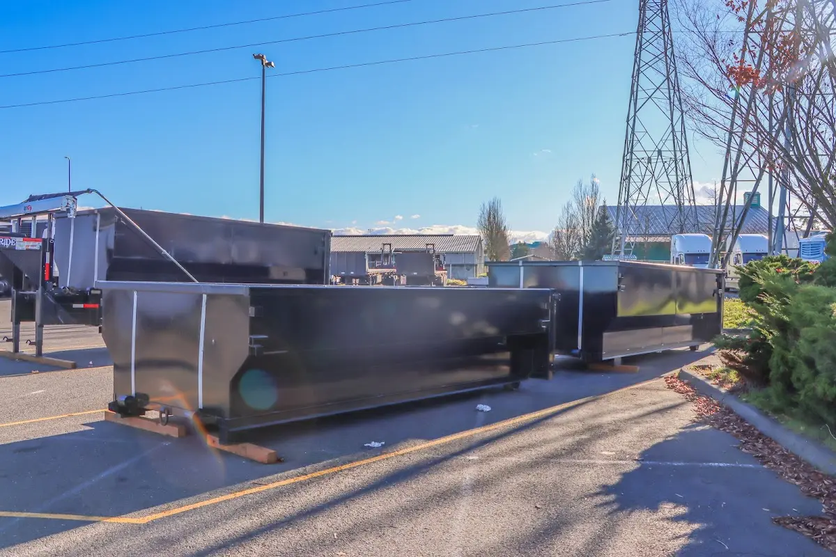 Roll-off dumpster ready for waste disposal at job site for Demolition Dumpster Rental in Penfield